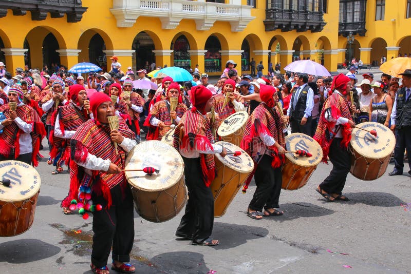 Local men playing drums during Festival of the Virgin de la Candelaria in Lima, Peru royalty free stock photography Local men playing drums during Festival of the Virgin de la Candelaria in Lima, Peru royalty free stock photography