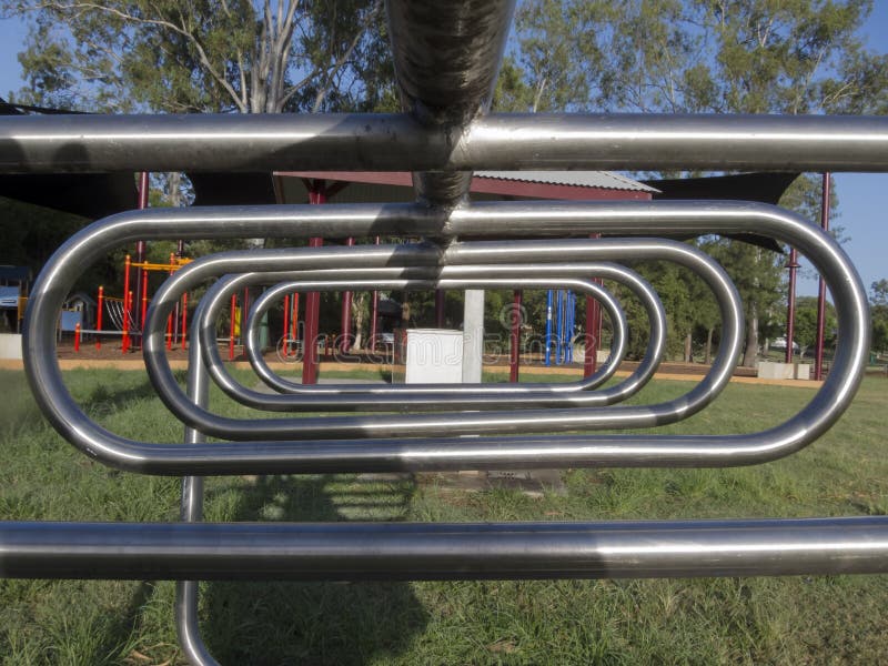 Bicycle rack in the park stock image. Image of design 117536395