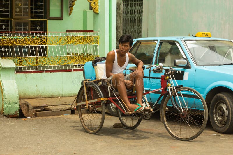 Local taxi tricycle driver stock photo Local taxi tricycle driver stock photo
