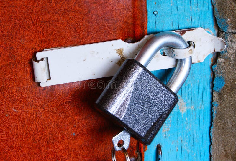 Lock hanging on the door stock photo. Image of castle 63753316
