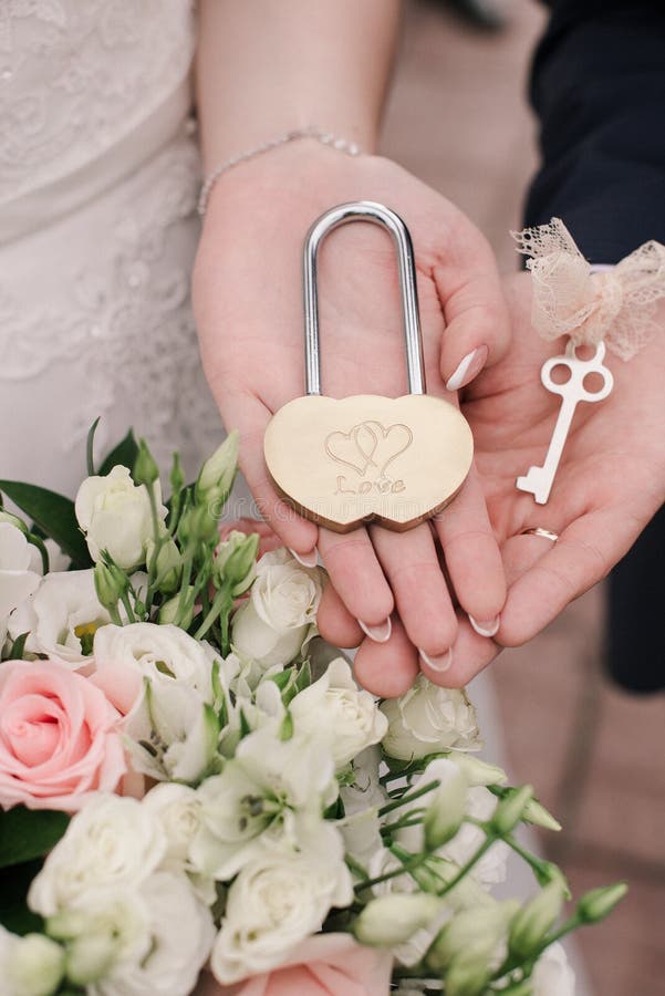 Lock with Heart and Key at the Wedding. Wedding Ceremonies Stock Image