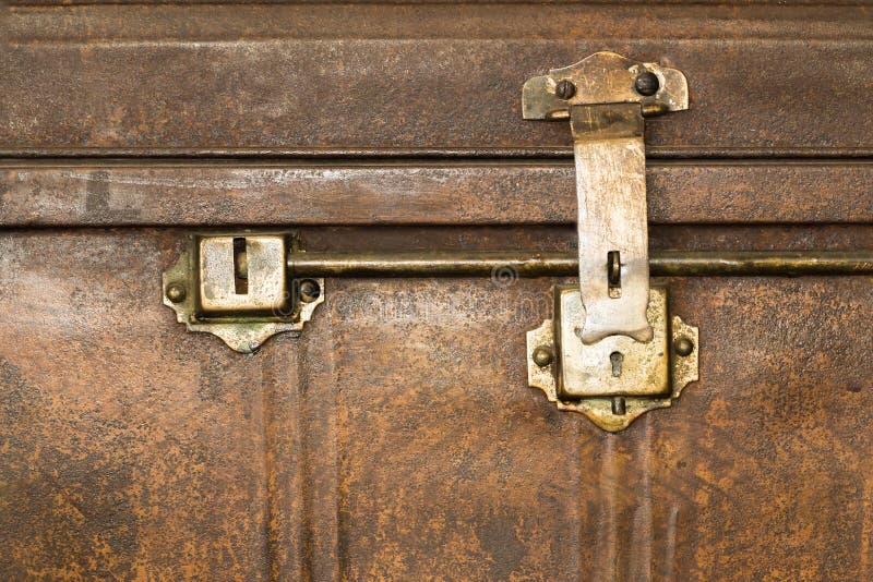 Lock of an old metal casket close up