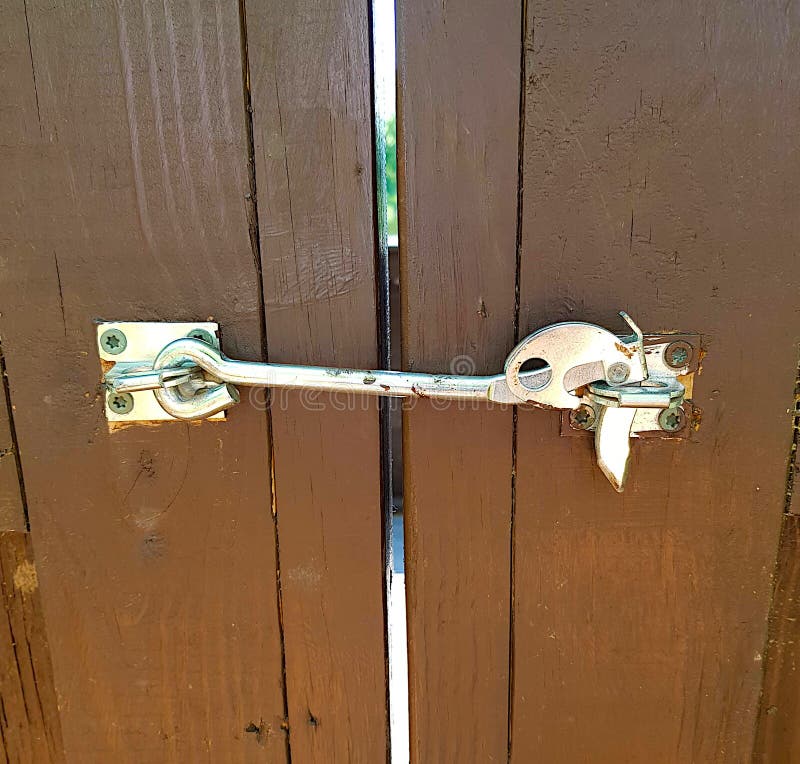 Lock on wooden doors stock photo. Image of security 176172680