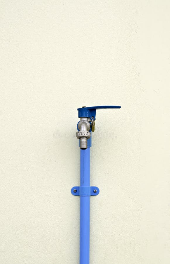 Locked Faucet with Blue PVC Pipe on Concrete Wall Stock Image Image