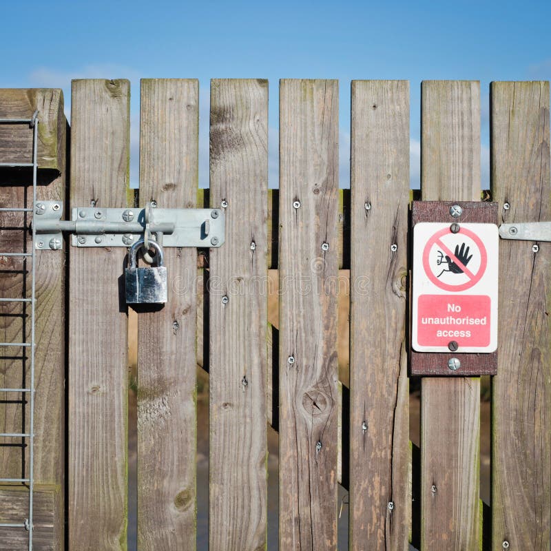 Locked gate stock photo