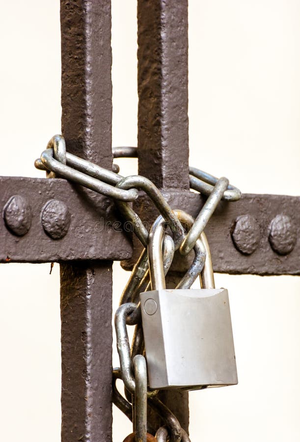 Locked Iron Prison Gate stock photo. Image of security 44767082