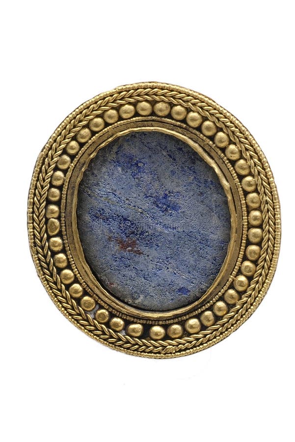 Gold locket with blue center. Gold locket with blue center