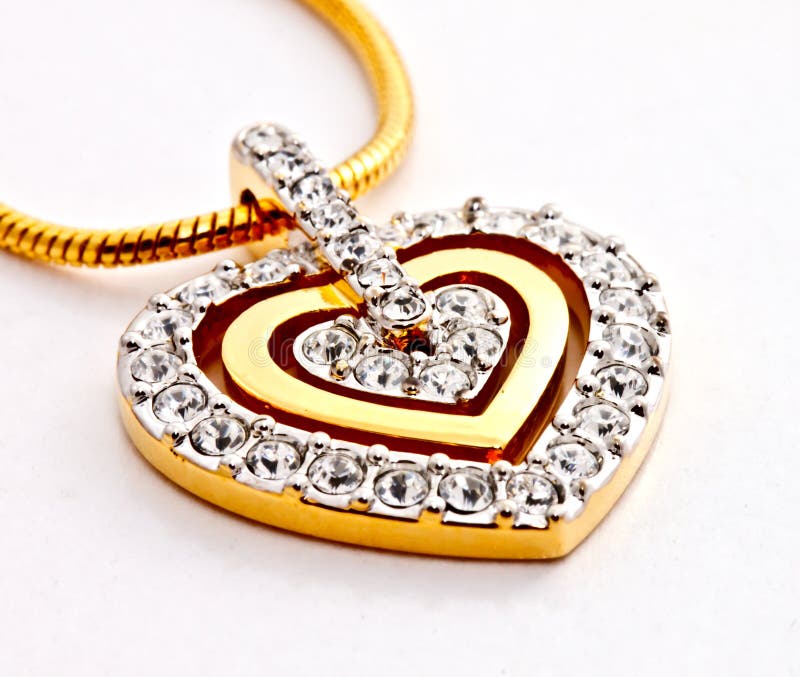 Heart shape diamond locket on white background. Heart shape diamond locket on white background