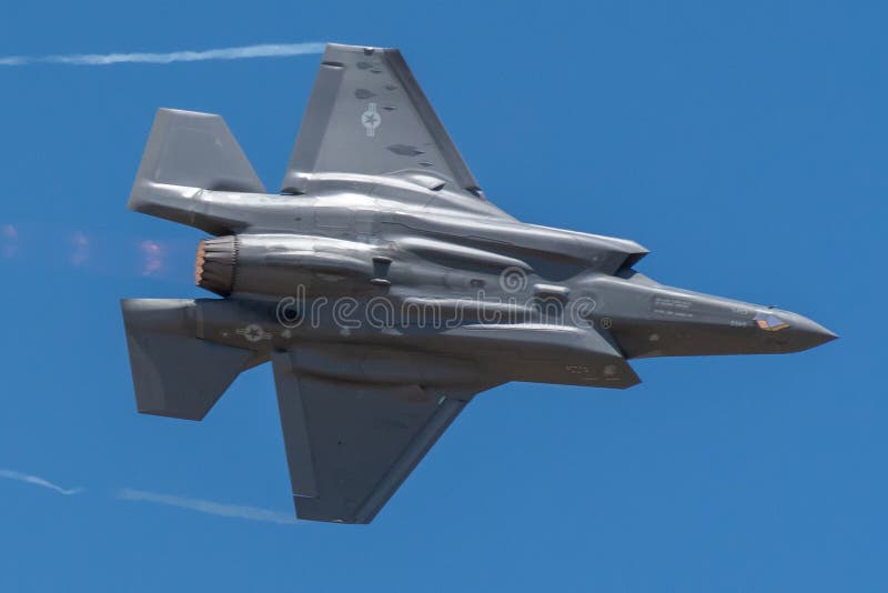 Lockheed Martin F-35 Lightning II performing Aerobatics at Hill AFB in blue sky