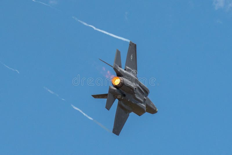 Lockheed Martin F-35 Lightning II performing Aerobatics at Hill AFB in blue sky