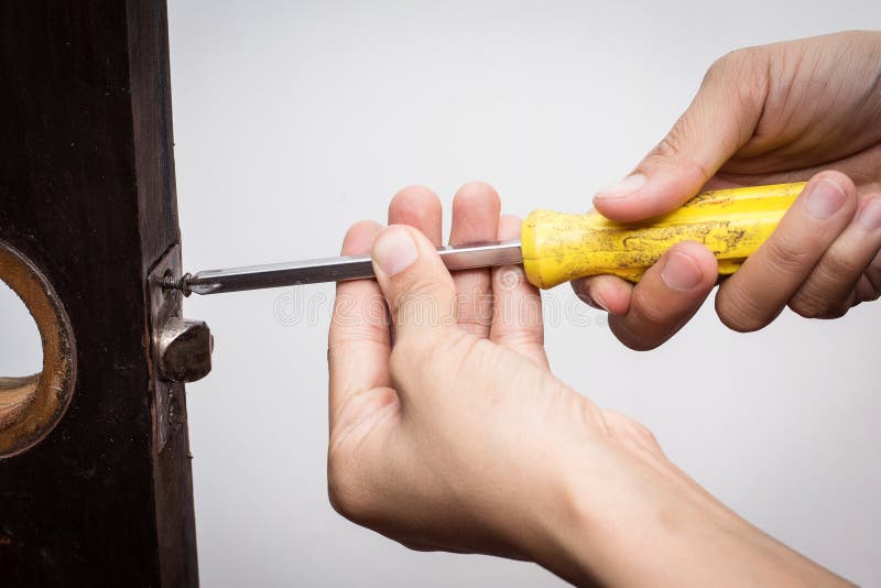 Locksmith Fix Lock on Wooden Door Stock Photo Image of repair, hand