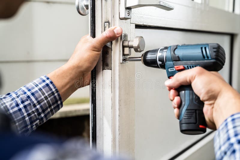 Locksmith Lock Door Repair. Worker Changing Stock Image Image of