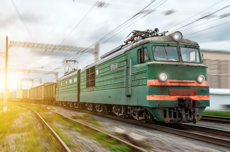 Electric with a Freight Train at High Speed Rides by Rail. Stock Image Image of