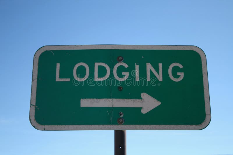 Lodging sign with arrow isolated on blue