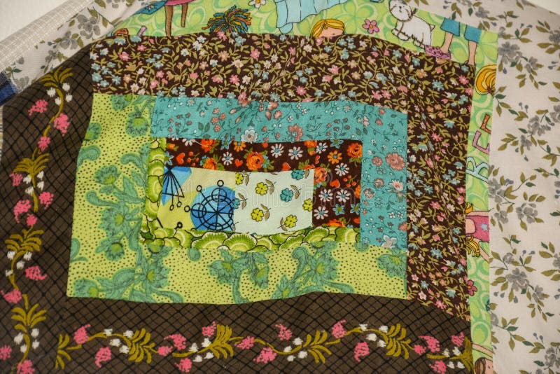 Log Cabin Quilt Square Green and Brown stock image