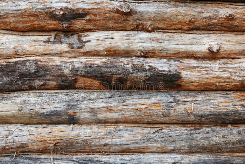Log cabin wooden facade texture or rustic wood horizontal background. Full screen stock photo