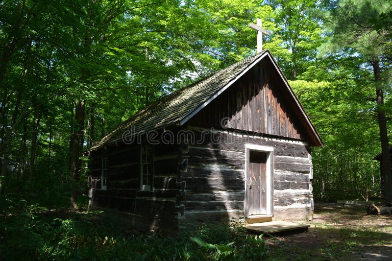A log chapel built in a sparsely populated area in the forest in the late 18th century in Canada. It was used for religious services and other gatherings.