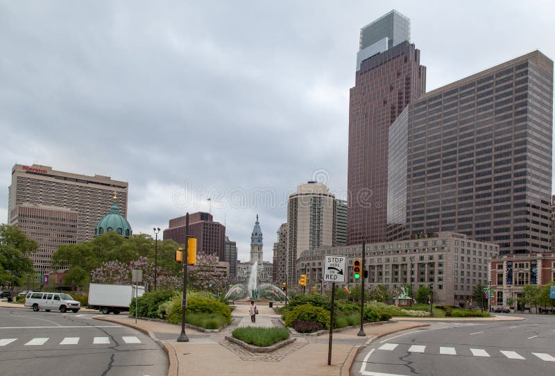 Logan Square, the town hall tower and the modern glass windows building towers of downtown. Philadelphia, Pennsylvania, United States. Logan Square, the town hall tower and the modern glass windows building towers of downtown. Philadelphia, Pennsylvania, United States.