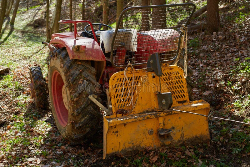 Logging tractor with winch stock photo. Image of forestry 52753802