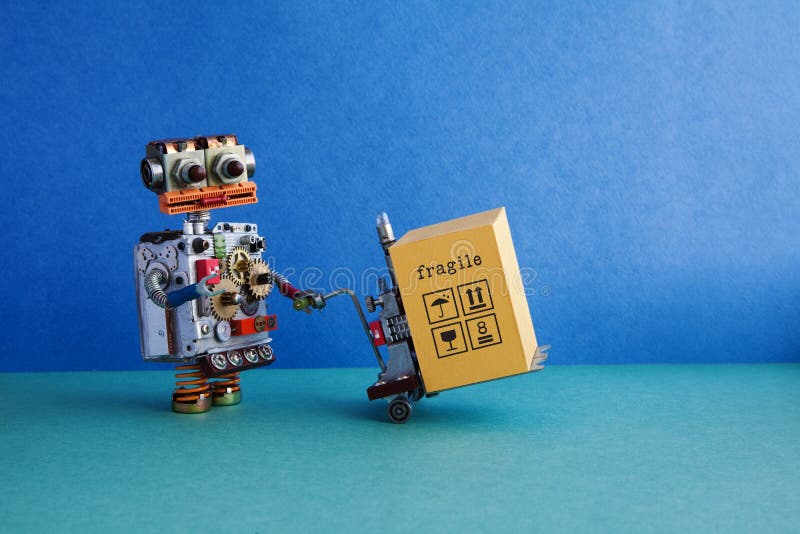 Logistisk robothemsändningautomation Vänlig robotic leksak, driven palettstålar, laddad gaffeltruckvagnsmekanism royaltyfri fotografi Logistisk robothemsändningautomation Vänlig robotic leksak, driven palettstålar, laddad gaffeltruckvagnsmekanism royaltyfri fotografi