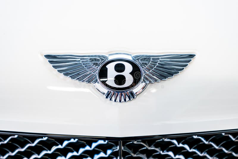 Un emblème Bentley à l'avant d'une voiture blanche photo – Photo Logo  Gratuite sur Unsplash