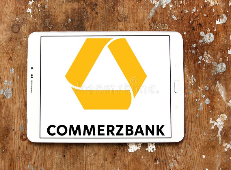 Logo of Commerzbank on samsung tablet on wooden background. Commerzbank AG is a global banking and financial services company based in germany. Logo of Commerzbank on samsung tablet on wooden background. Commerzbank AG is a global banking and financial services company based in germany