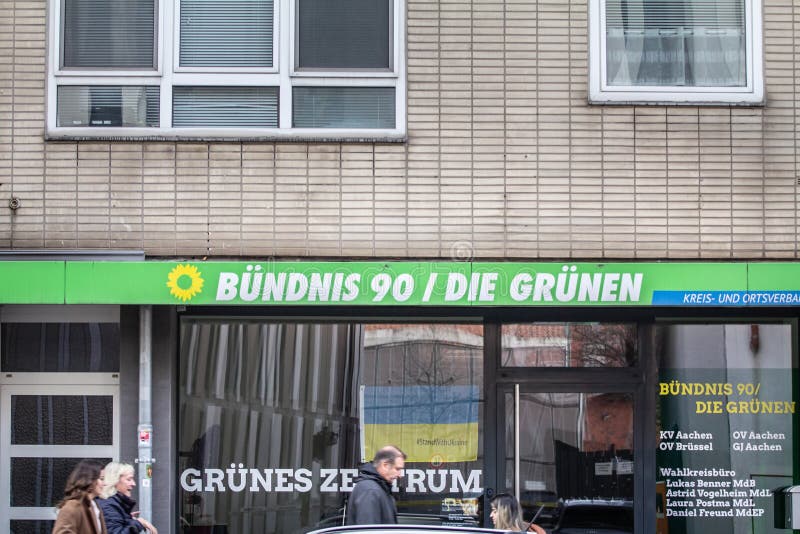 Aachen, Germany - November 10, 2022: Picture of a sign with the logo of Die Grunen on their local headquarters for Aachen. Alliance 90 The Greens , is a green political party in Germany. It was formed in 1993 by the merger of The Greens (formed in West Germany in 1980) and Alliance 90 (formed in East Germany in 1990). The Greens had itself merged with the East German Green Party after German. Aachen, Germany - November 10, 2022: Picture of a sign with the logo of Die Grunen on their local headquarters for Aachen. Alliance 90 The Greens , is a green political party in Germany. It was formed in 1993 by the merger of The Greens (formed in West Germany in 1980) and Alliance 90 (formed in East Germany in 1990). The Greens had itself merged with the East German Green Party after German