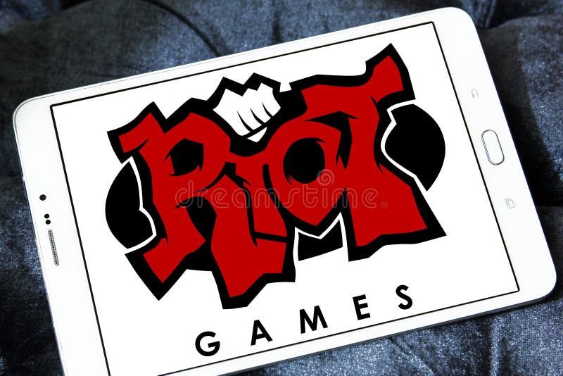 Logo of Riot Games company on samsung tablet. Riot Games is an American video game developer, publisher, and eSports tournament organizer established in 2006. Logo of Riot Games company on samsung tablet. Riot Games is an American video game developer, publisher, and eSports tournament organizer established in 2006