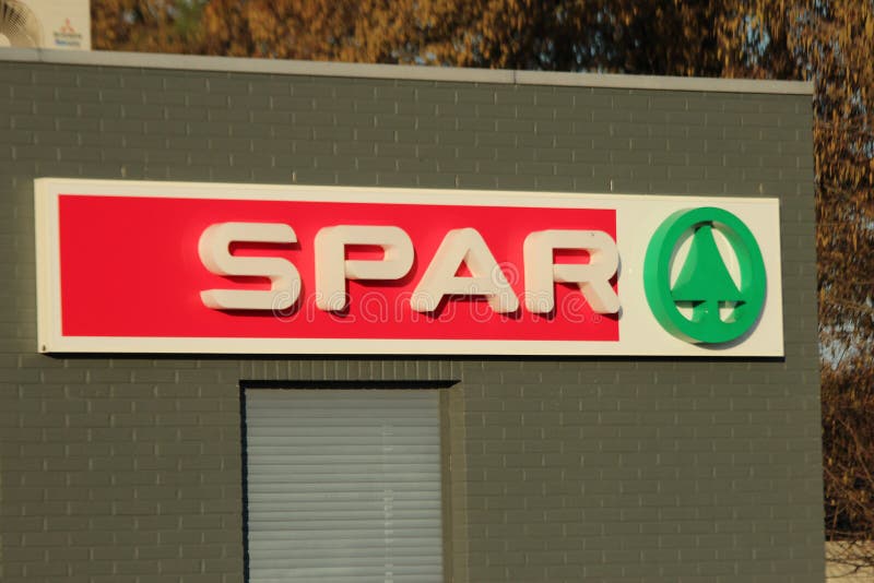 Logo of SPAR supermarktet at a Esso petrol station in NIeuwerkerk aan den ijssel in the Netherlands. stock image Logo of SPAR supermarktet at a Esso petrol station in NIeuwerkerk aan den ijssel in the Netherlands. stock image