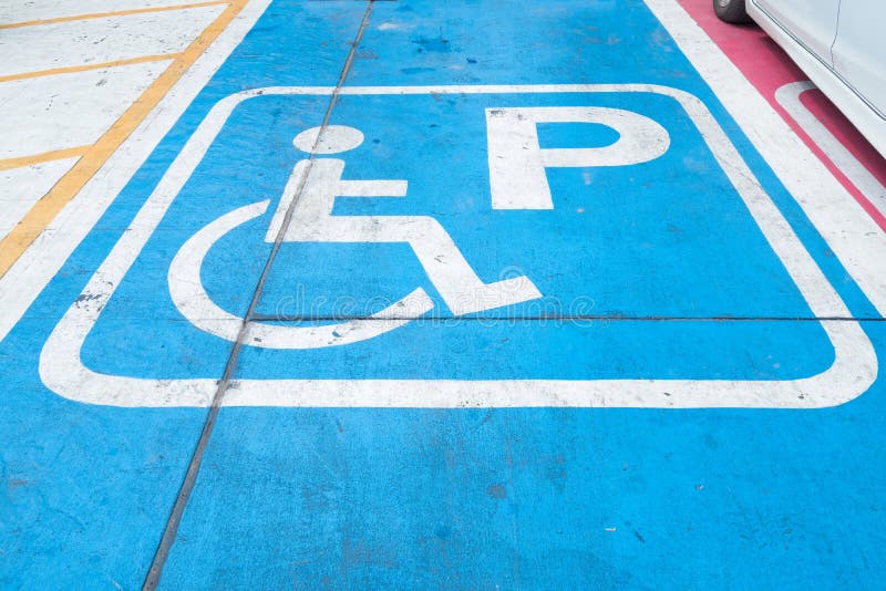 Logos for disabled on parking. handicap parking place sign stock photos