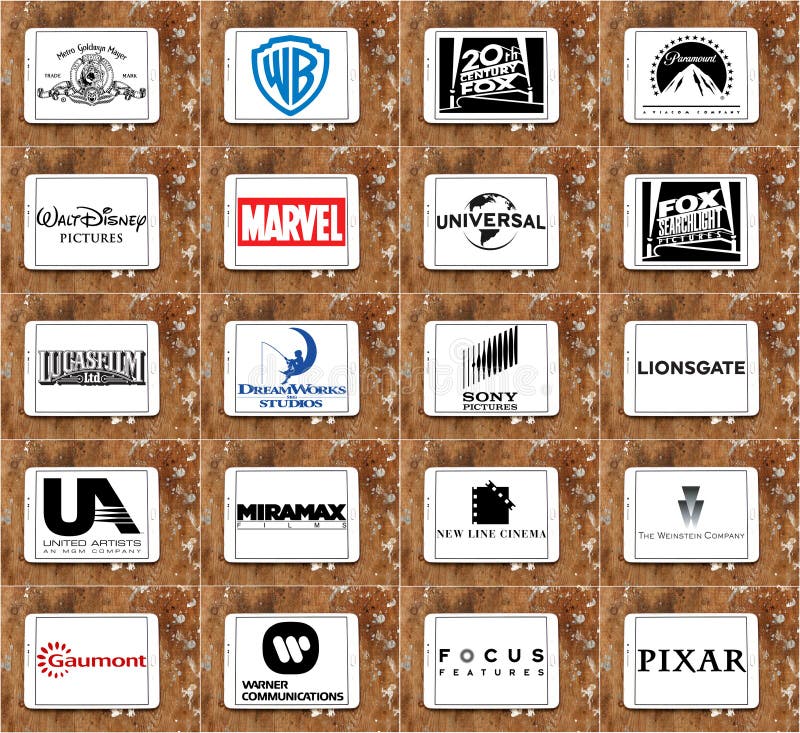 Collection of logos and vectors of most popular film studios and companies in the world on white tablet on rusty wooden background. studios like marvel, sony pictures, lionsgate, walt disney, paramount, mgm, warner bros. Collection of logos and vectors of most popular film studios and companies in the world on white tablet on rusty wooden background. studios like marvel, sony pictures, lionsgate, walt disney, paramount, mgm, warner bros.
