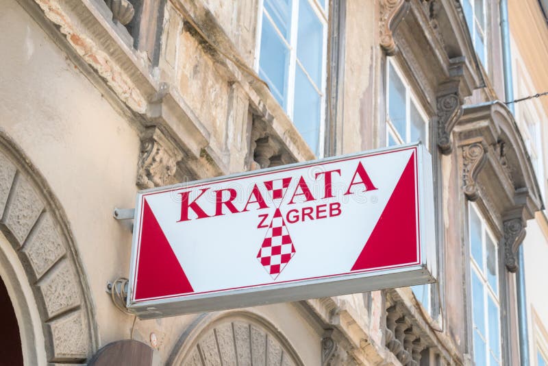 Zagreb, Croatia - June 2, 2022: Logo of Kravata Zagreb shop with ties and neckties. Zagreb, Croatia - June 2, 2022: Logo of Kravata Zagreb shop with ties and neckties