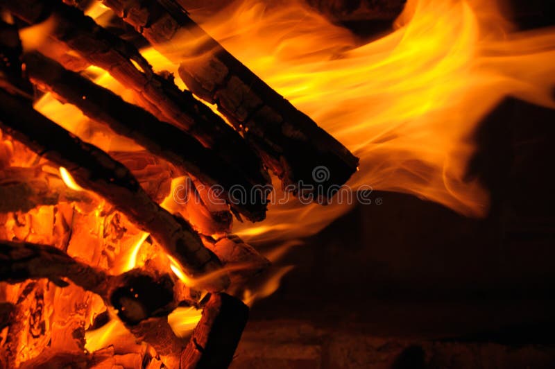Logs burning on fire stock images