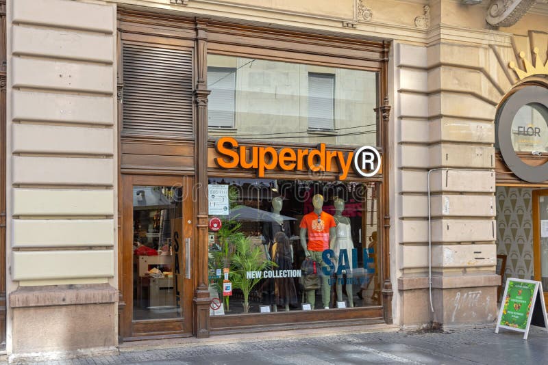 Loja De Superdry Projeto E Fabricação Da Roupa De Superdry Compan Foto  Editorial - Imagem de projeto, parede: 84436851