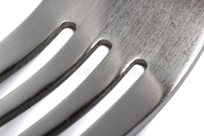 Lokalisiertes selektives fokussierendes Supermakro der einzelnen Gabel auf Weiß stockbild Lokalisiertes selektives fokussierendes Supermakro der einzelnen Gabel auf Weiß stockbild