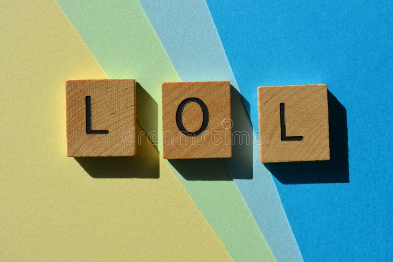 A Pretty Young Teen Happily Holding Rustic Alphabet Blocks With Her  Text-message Abbreviation: LOL (meaning Laughing Out Loud). On A White  Background. Stock Photo, Picture and Royalty Free Image. Image 26610107.