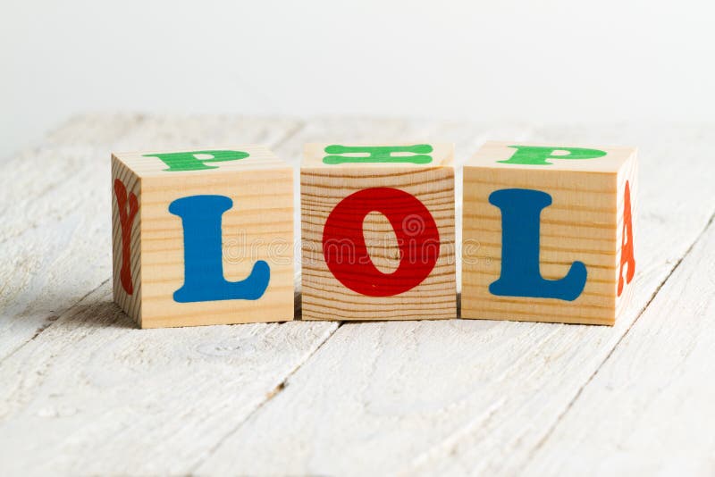 A Pretty Young Teen Happily Holding Rustic Alphabet Blocks With Her  Text-message Abbreviation: LOL (meaning Laughing Out Loud). On A White  Background. Stock Photo, Picture and Royalty Free Image. Image 26610107.