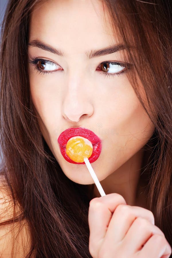 Lollipop in her mouth stock image. Image of chick, cosmetic 22934935