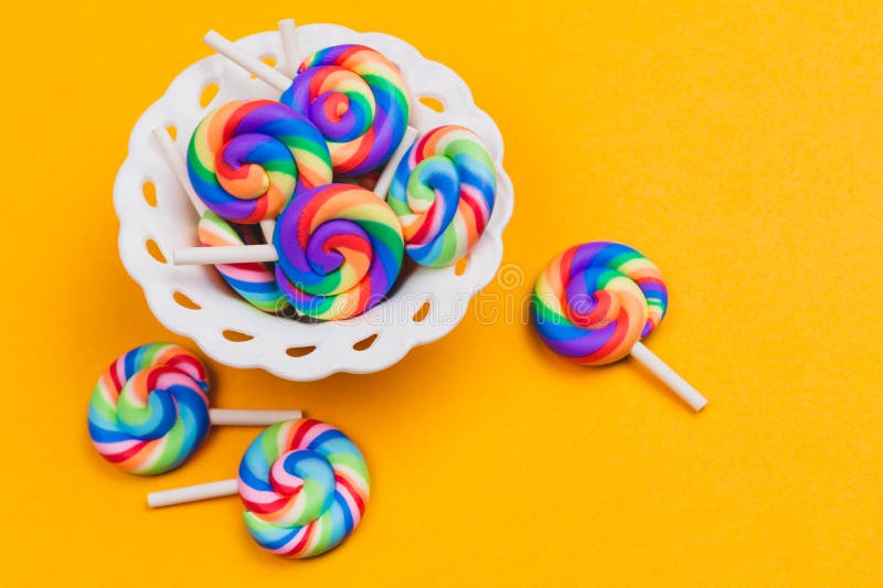 Lollipops Close Up Colorful Candies On A Yellow Background Festive