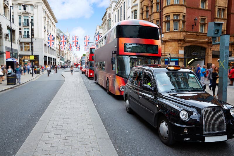 London bus and taxi Oxford Street W1 Westminster in UK England. London bus and taxi Oxford Street W1 Westminster in UK England