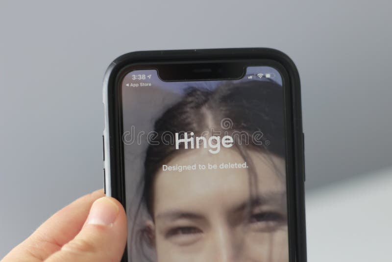 London Canada, February 21 2021: Editorial illustrative photo of someone downloading the dating app hinge. A popular app. High quality photo