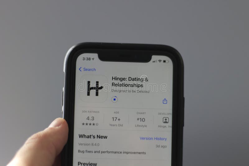 London Canada, February 21 2021: Editorial illustrative photo of someone downloading the dating app hinge. A popular app. High quality photo