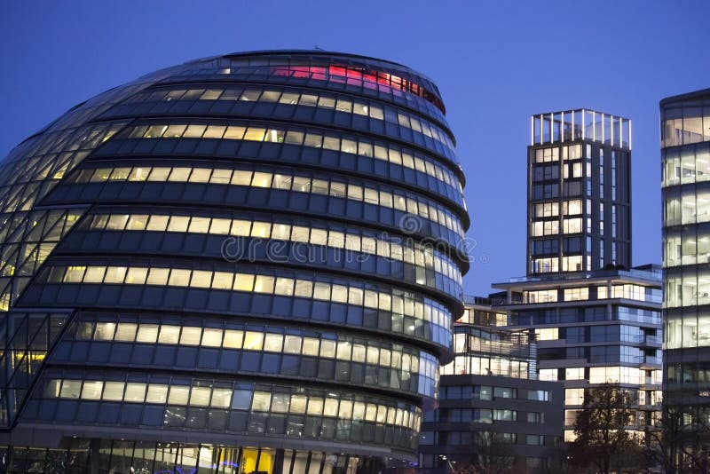 London City Hall Building and Tower Bridge on November 18, 2016 in London, UK. The City hall building has an unusual, bulbous sha