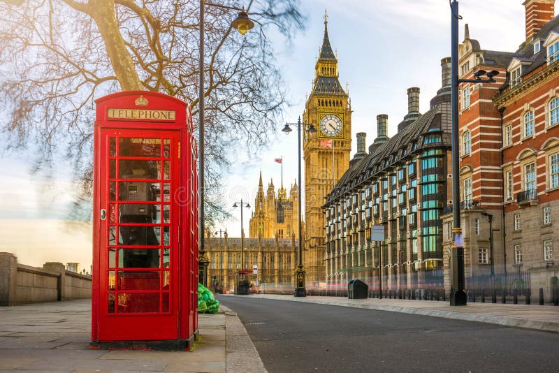 London, England - British old red telephone box with Big Ben