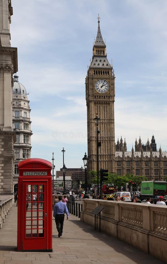 LONDON - JULY 25: London traffic with red phone booth and Big Ben on July 25, 2013 in London, England stock photos LONDON - JULY 25: London traffic with red phone booth and Big Ben on July 25, 2013 in London, England stock photos