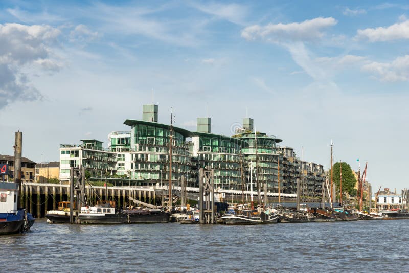 LONDON - JUNE 25 : Thames barges moored on the River Thames in L royalty free stock images