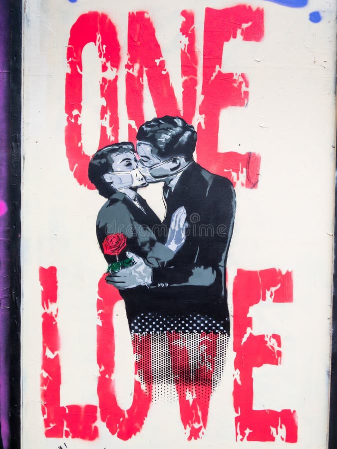 Lockdown, Graffiti art poster, one love, two people kissing and wearing face masks.