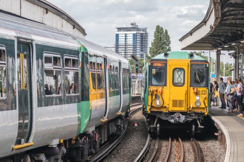 London train arriving on the platform stock photos