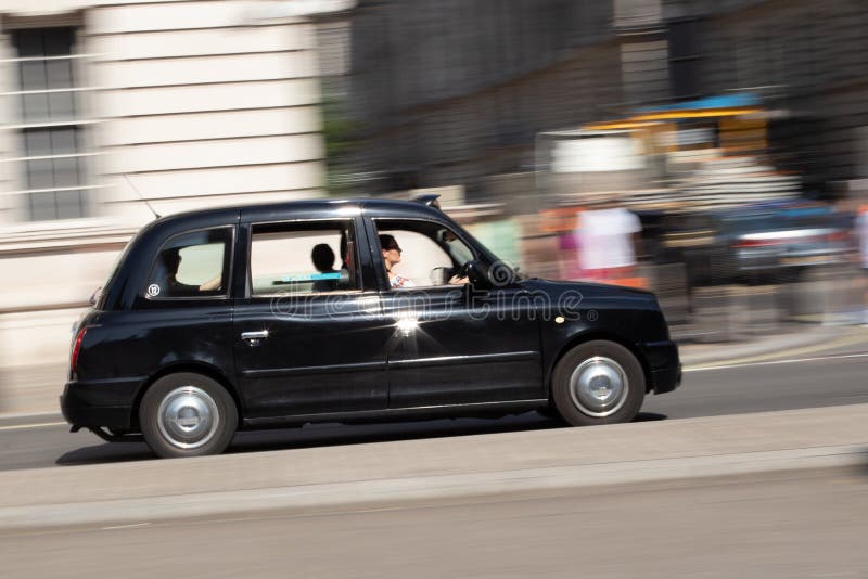London taxi on the road