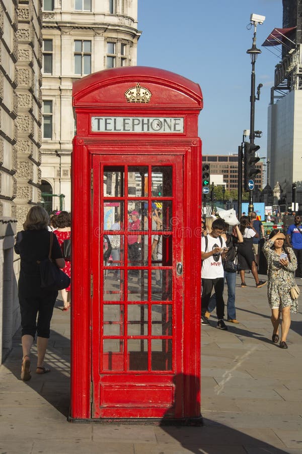 London, U.K., August 22, 2019 - Famous red telephone booth in London royalty free stock photo London, U.K., August 22, 2019 - Famous red telephone booth in London royalty free stock photo